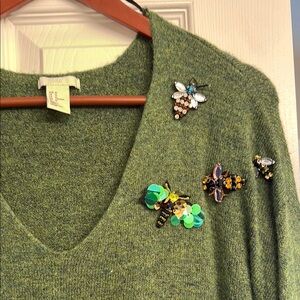 Green V-Neck Sweater with Embellished Insect Brooches